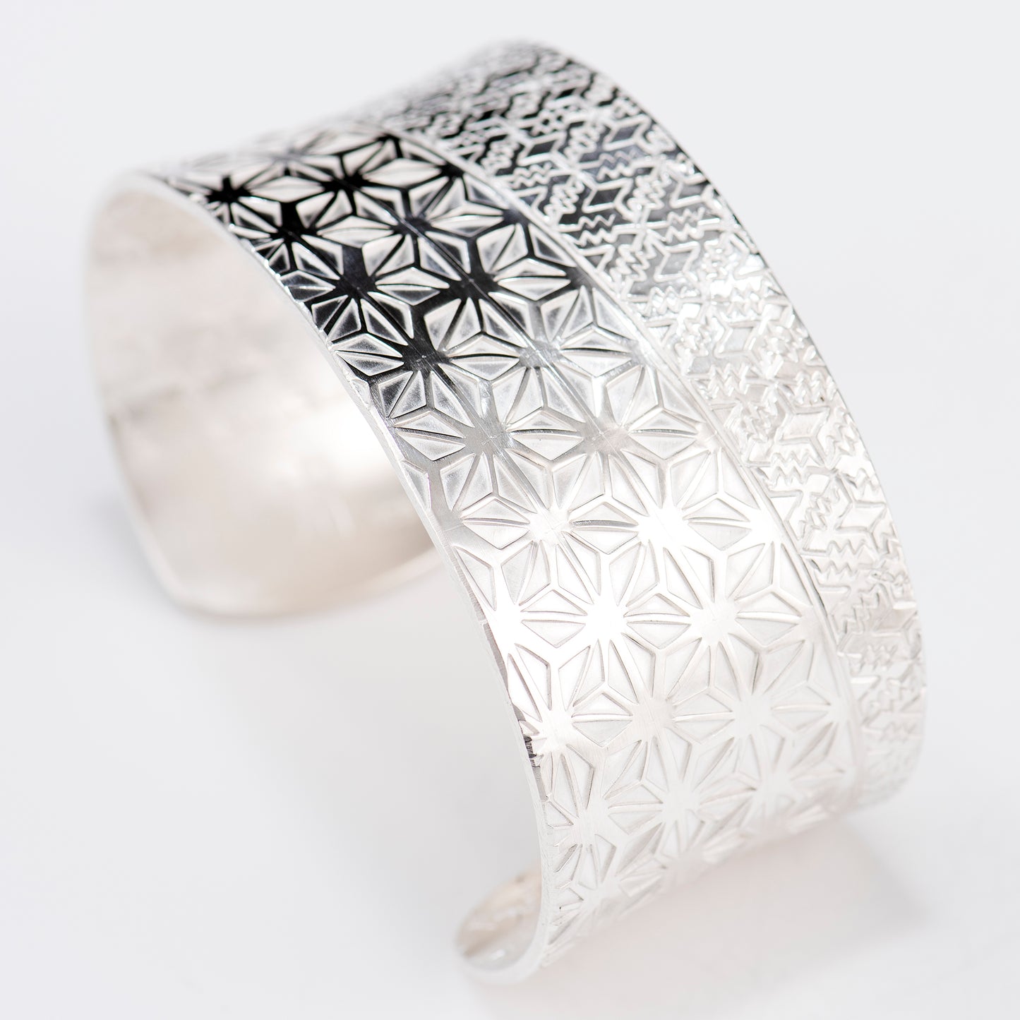 Anticlastic Cuff Featuring Hand-Stamped Traditional Japanese Asanoha Pattern and Repeating Triangle Pattern
