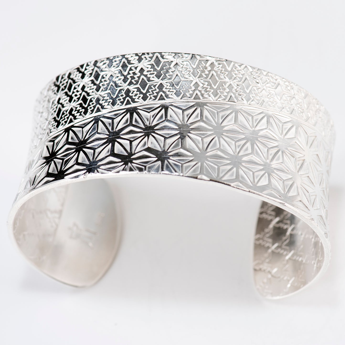 Anticlastic Cuff Featuring Hand-Stamped Traditional Japanese Asanoha Pattern and Repeating Triangle Pattern
