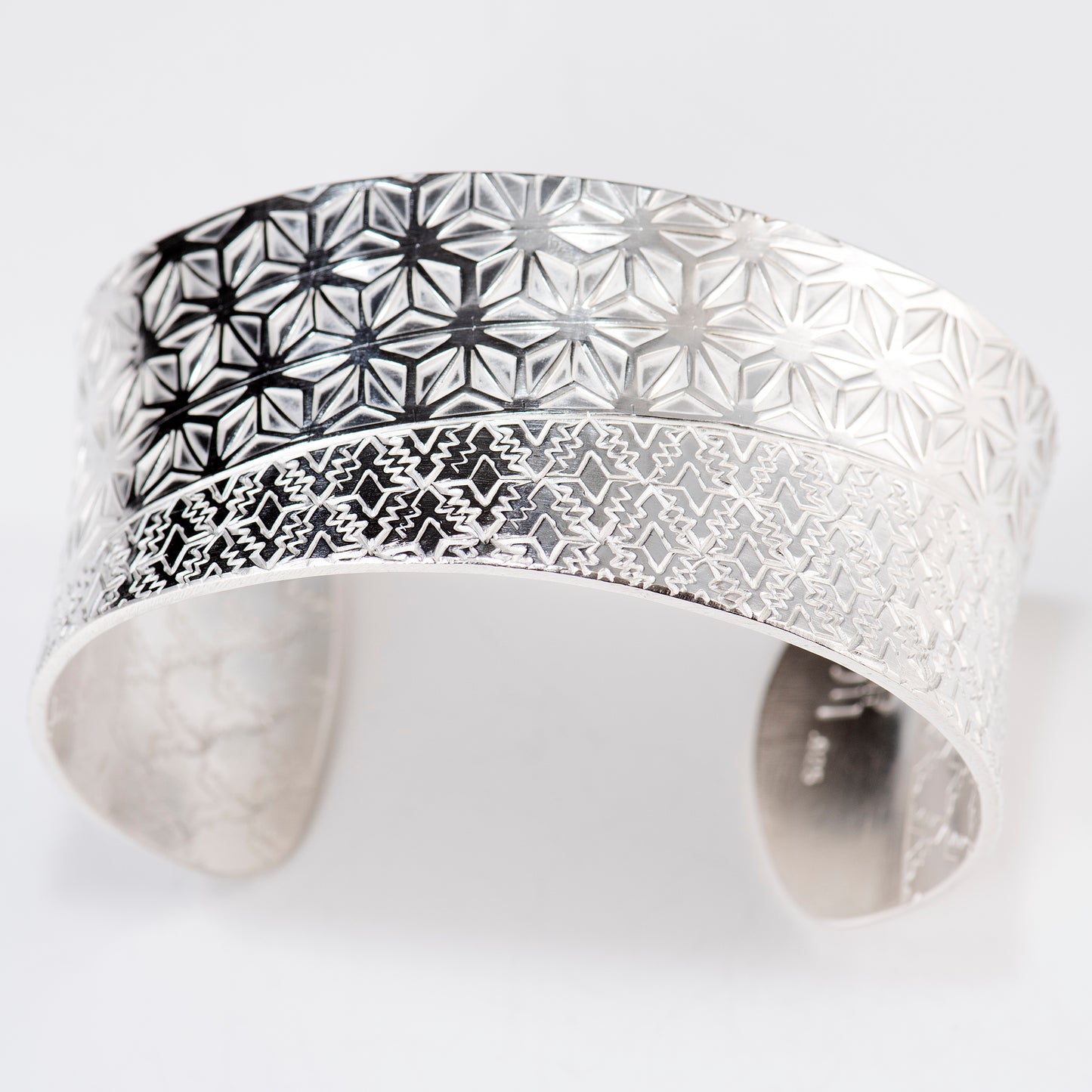 Anticlastic Cuff Featuring Hand-Stamped Traditional Japanese Asanoha Pattern and Repeating Triangle Pattern